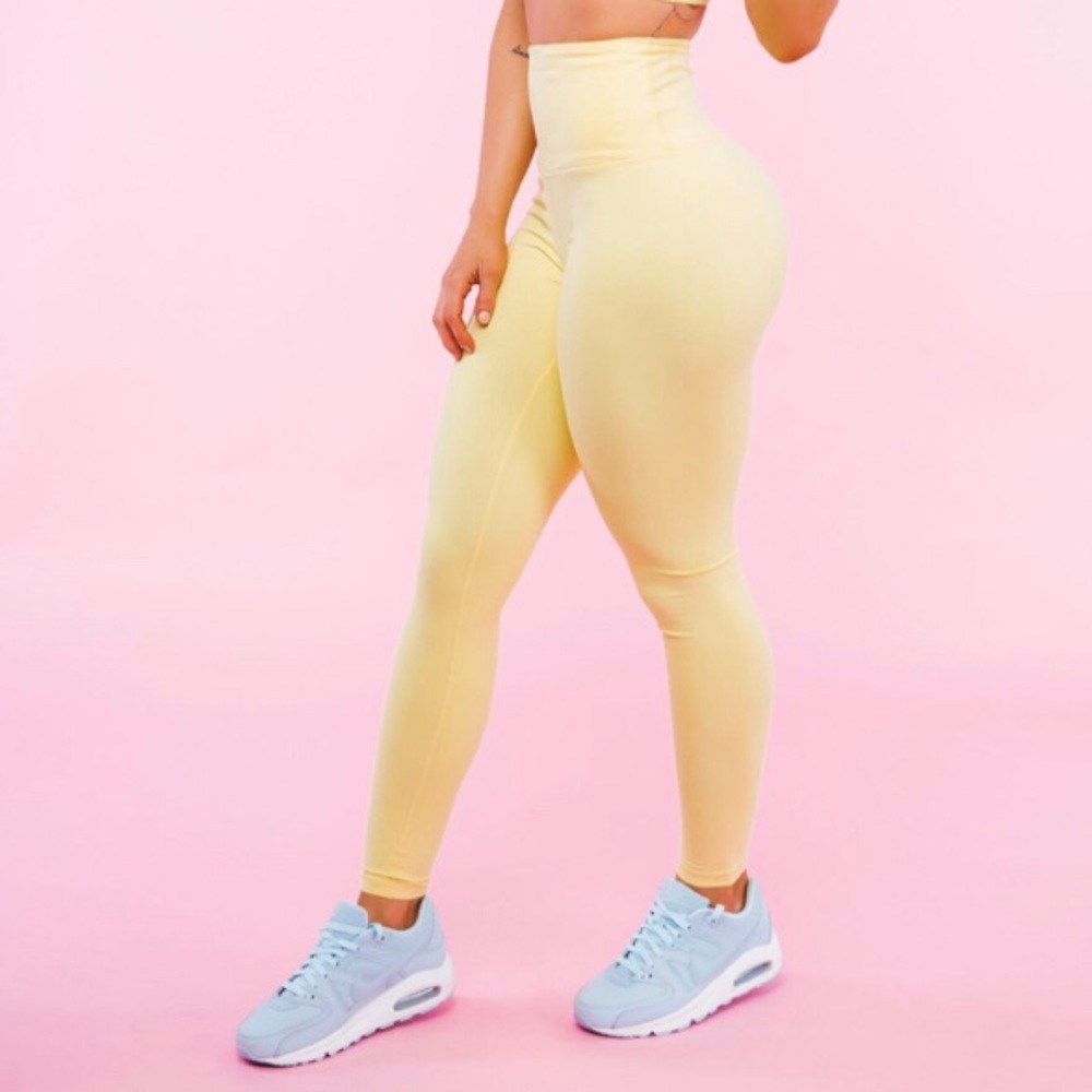 Size small pastel yellow leggings only worn once